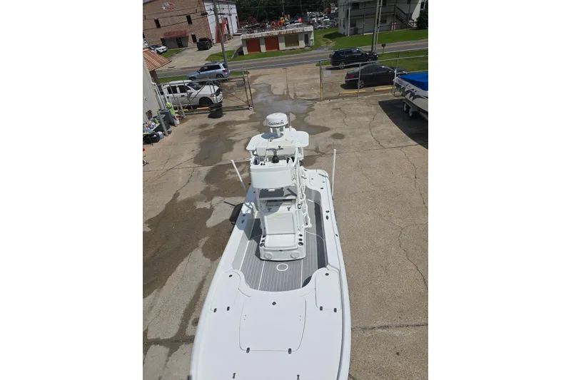 Slide: The Image of 2007 Yellowfin 24 Bay boat in a parking lot, aerial view. - 8