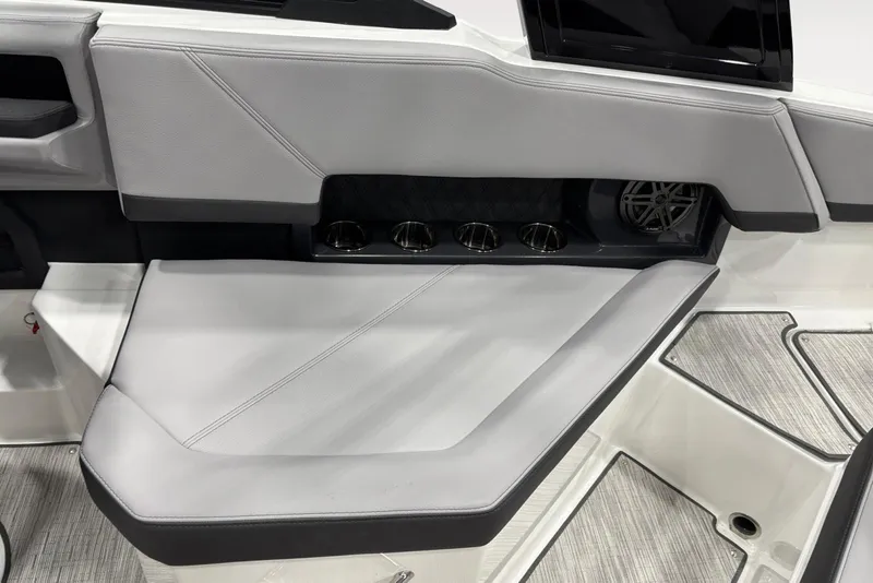 Slide: The Image of Interior of 2026 Cobalt R4 boat featuring sleek seating and integrated cup holders. - 15