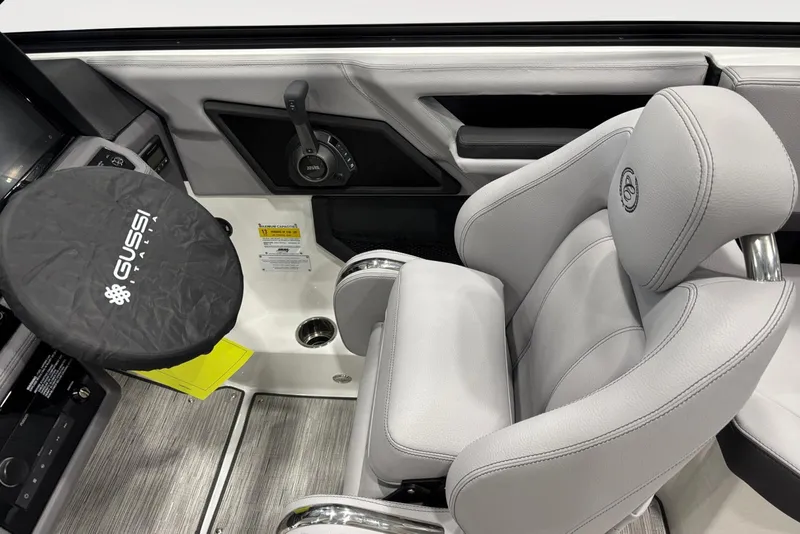 Slide: The Image of 2026 Cobalt R4 boat interior with Gussi Italia steering wheel and luxurious seating. - 9