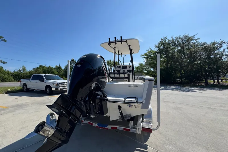 Slide: The Image of 2027 Sea Born LX21 Center Console boat with Mercury outboard motor on trailer. - 11