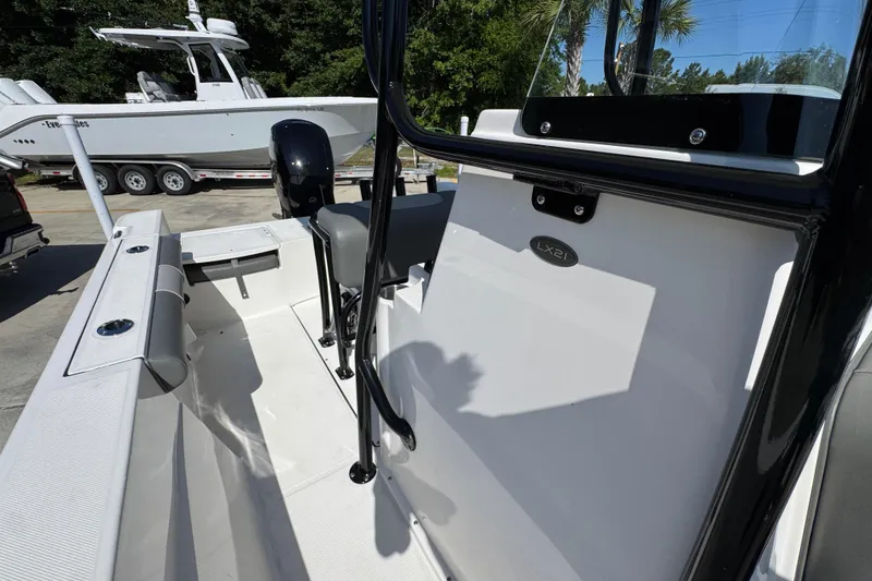 Slide: The Image of 2027 Sea Born LX21 Center Console boat interior with seating and console details. - 22