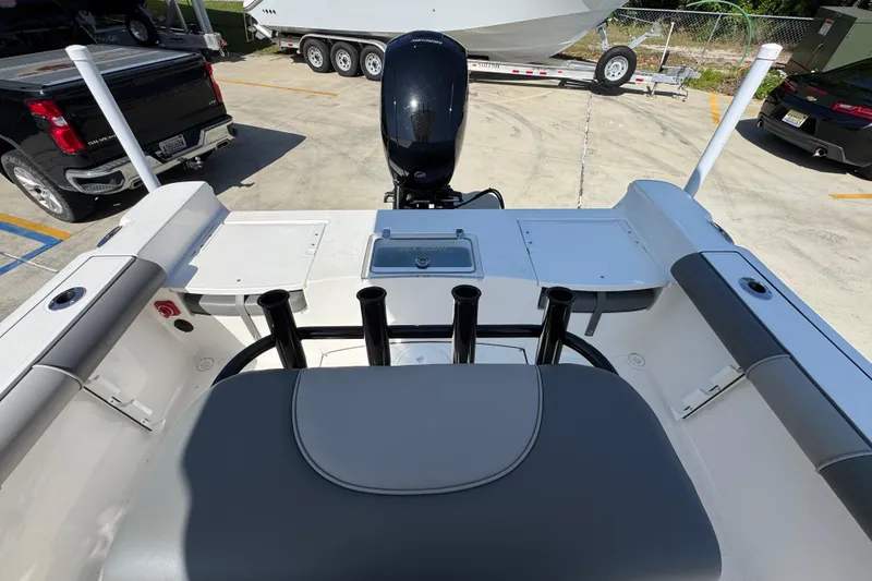 Slide: The Image of 2027 Sea Born LX21 Center Console boat interior with seating and rod holders. - 24