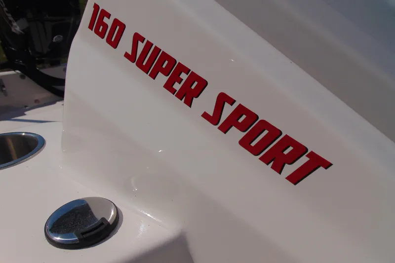 Slide: The Image of 2026 Boston Whaler 160 Super Sport boat detail with red lettering. - 10
