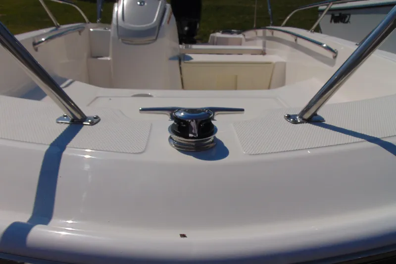 Slide: The Image of 2026 Boston Whaler 160 Super Sport boat interior with stainless steel fittings. - 13