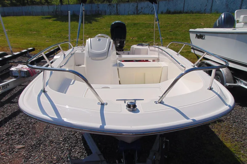 Slide: The Image of 2026 Boston Whaler 160 Super Sport boat on display, featuring sleek design and modern amenities. - 2
