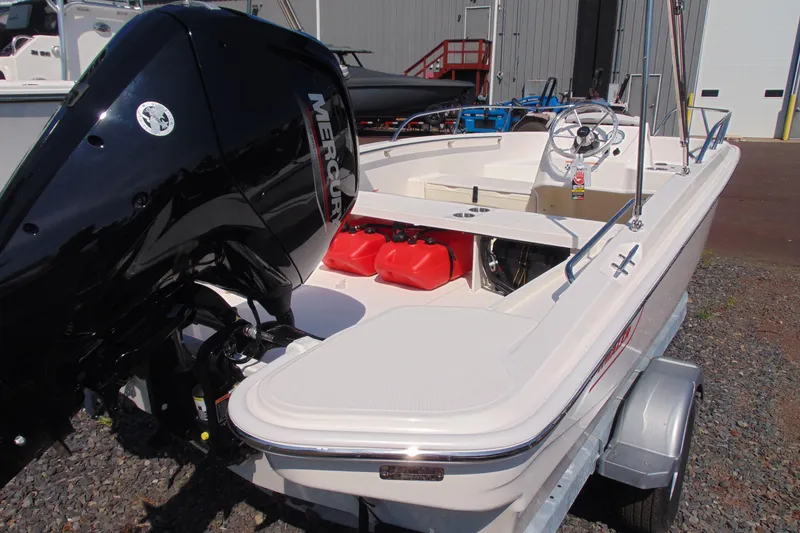 Slide: The Image of 2026 Boston Whaler 160 Super Sport boat with Mercury engine on trailer. - 5