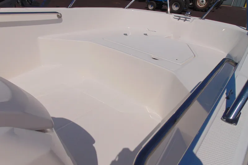 Slide: The Image of 2026 Boston Whaler 160 Super Sport interior, showcasing sleek design and spacious seating area. - 9