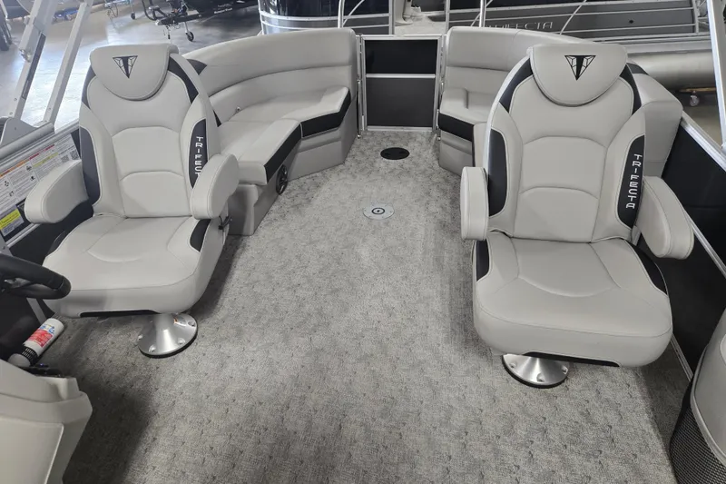 Slide: The Image of Interior of 2025 Trifecta 20RF LE pontoon boat with luxurious seating and modern design. - 10