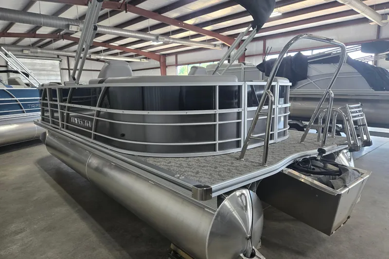 Slide: The Image of 2025 Trifecta 20RF LE pontoon boat in a warehouse setting. - 3