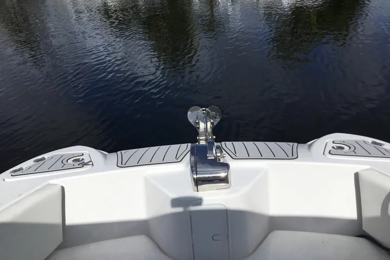 Slide: The Image of Bow view of 2020 Twin Vee 240 DC GF boat on calm water. - 14