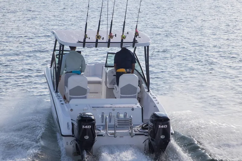 Slide: The Image of Manufacturer Provided Image: 2020 Twin Vee 240 DC GF boat with dual outboard engines on water. - 27