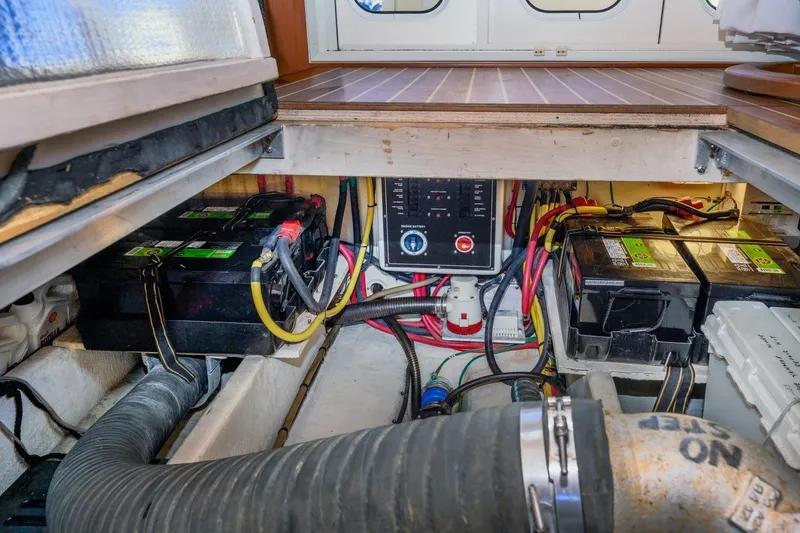 Slide: The Image of Electrical system and battery compartment of 2009 Mainship 40 Expedition boat. - 30
