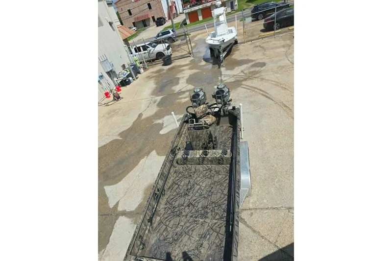 Slide: The Image of 2021 Prodrive 2060 boat with dual motors parked on concrete surface. - 7