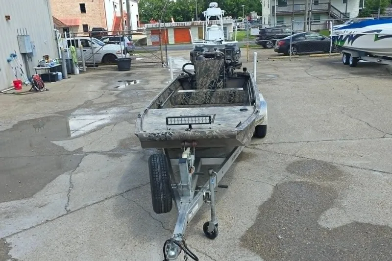Slide: The Image of Prodrive 2060 boat on trailer in parking lot, 2021 model. - 9