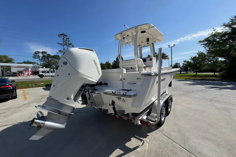 Slide: The Image of 2027 Sea Born LX22 Center Console boat with Mercury outboard engine on trailer. - 10