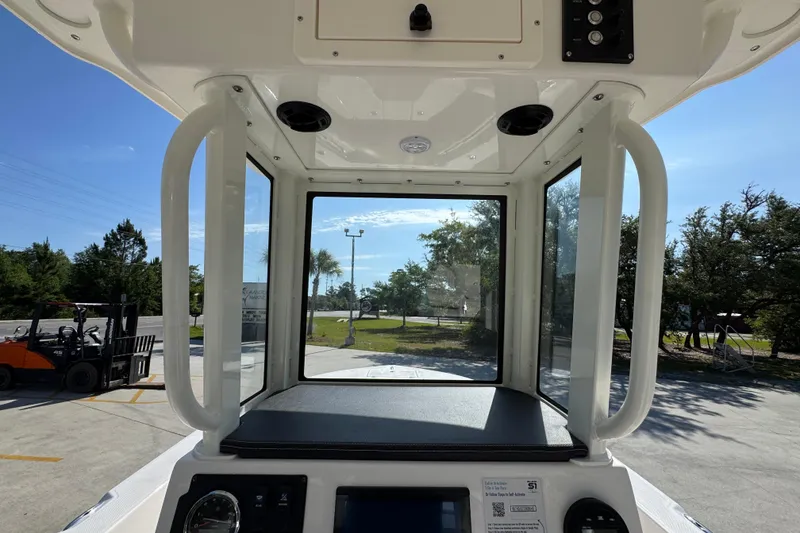 Slide: The Image of Interior view of 2027 Sea Born LX22 Center Console boat, showcasing helm and controls. - 31