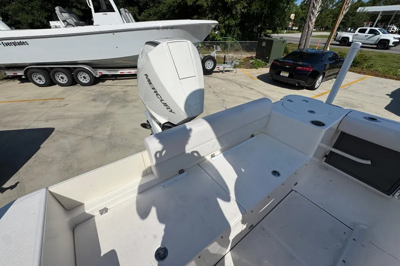Slide: The Image of 2027 Sea Born LX22 Center Console boat with Mercury engine in parking lot. - 35