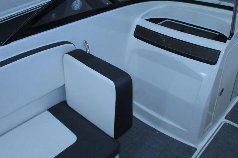 Slide: The Image of 2020 Bayliner VR4 Bowrider OB interior seating with sleek black and white design. - 13