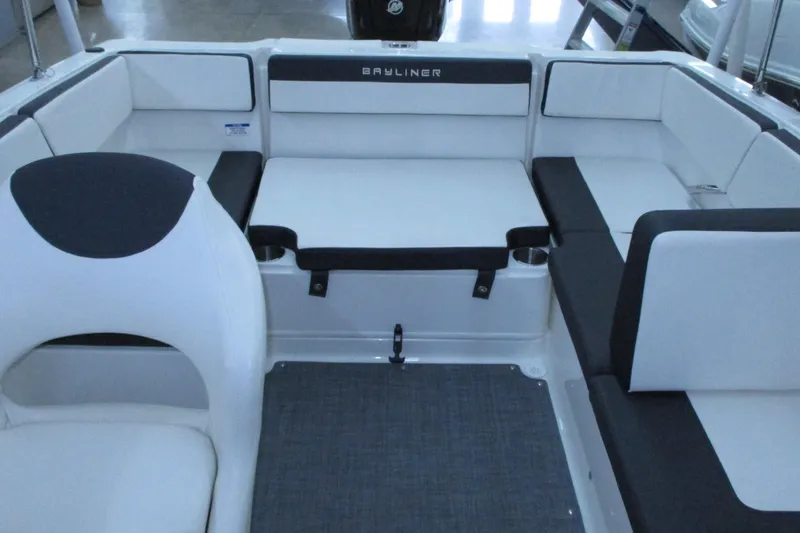 Slide: The Image of 2020 Bayliner VR4 Bowrider OB interior seating with white and black upholstery. - 16