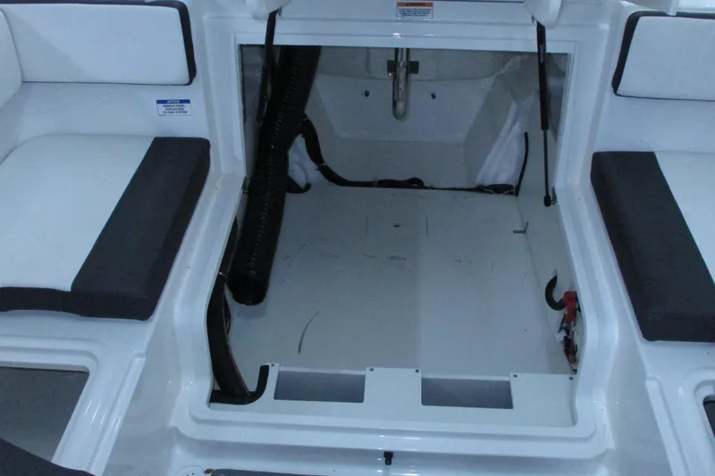 Slide: The Image of 2020 Bayliner VR4 Bowrider OB interior storage compartment with seating. - 17