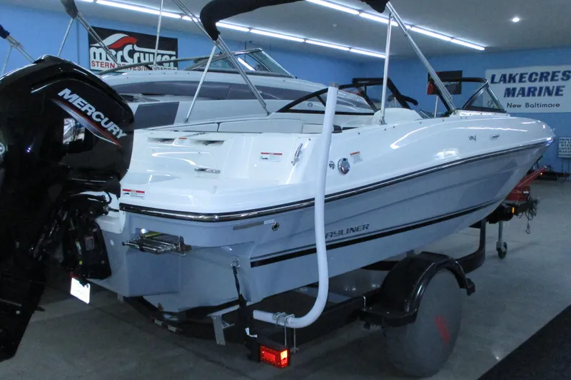 Slide: The Image of 2020 Bayliner VR4 Bowrider OB with Mercury engine in showroom. - 2
