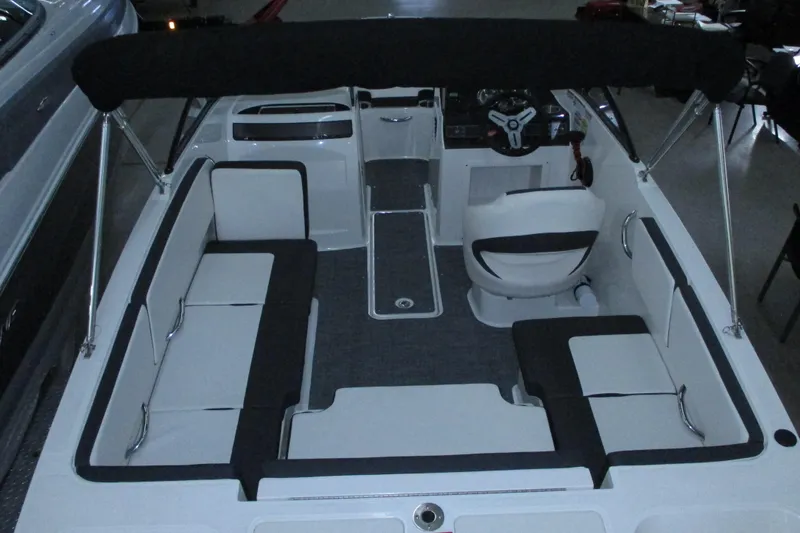 Slide: The Image of 2020 Bayliner VR4 Bowrider OB interior with seating and steering wheel. - 3
