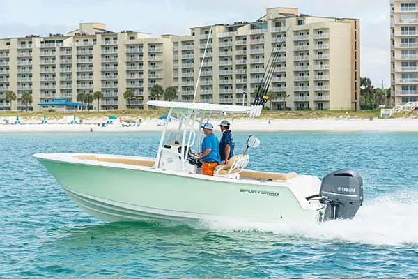 The Image of Manufacturer Provided Image: 2021 Sportsman Open 232 Center Console boat cruising near beachfront condos. - 0