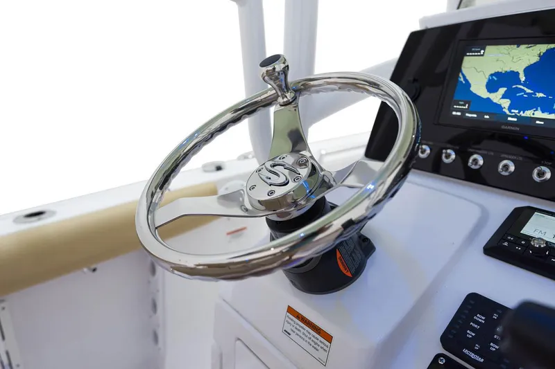 Slide: The Image of Manufacturer Provided Image: 2021 Sportsman Open 232 Center Console steering wheel and navigation display. - 11