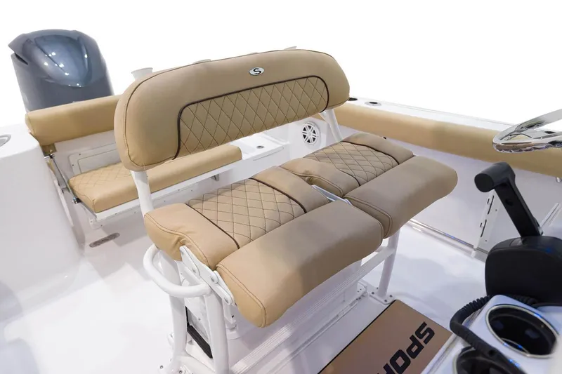 Slide: The Image of Manufacturer Provided Image: 2021 Sportsman Open 232 Center Console boat with tan cushioned seating. - 12