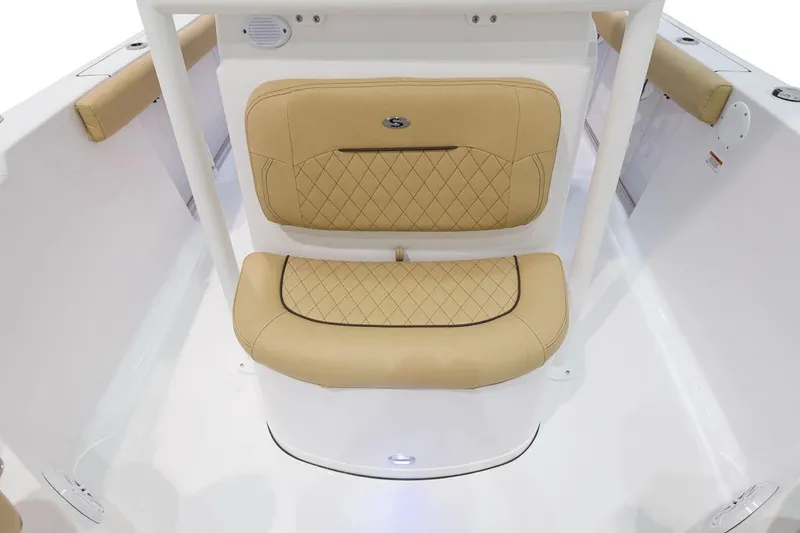 Slide: The Image of Manufacturer Provided Image: 2021 Sportsman Open 232 Center Console boat with tan cushioned seating. - 8