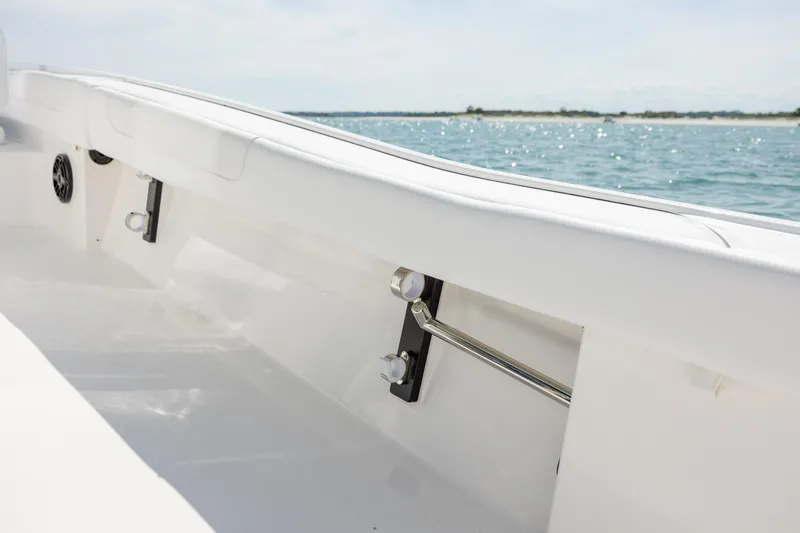 Slide: The Image of 2026 Caymas 281 HB boat interior with sleek white design and ocean view. - 31