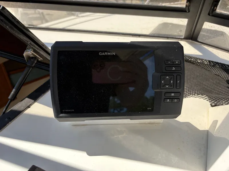 Slide: The Image of Garmin Striker DV on 1996 Carolina Classic 25 Express. - 18