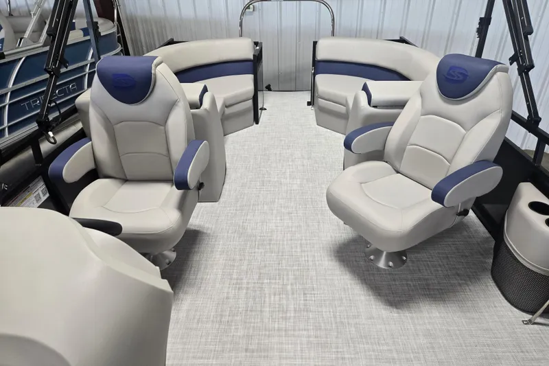 Slide: The Image of Luxury seating on 2026 Dockside 22DQ275 boat, featuring plush white and blue captain chairs. - 11