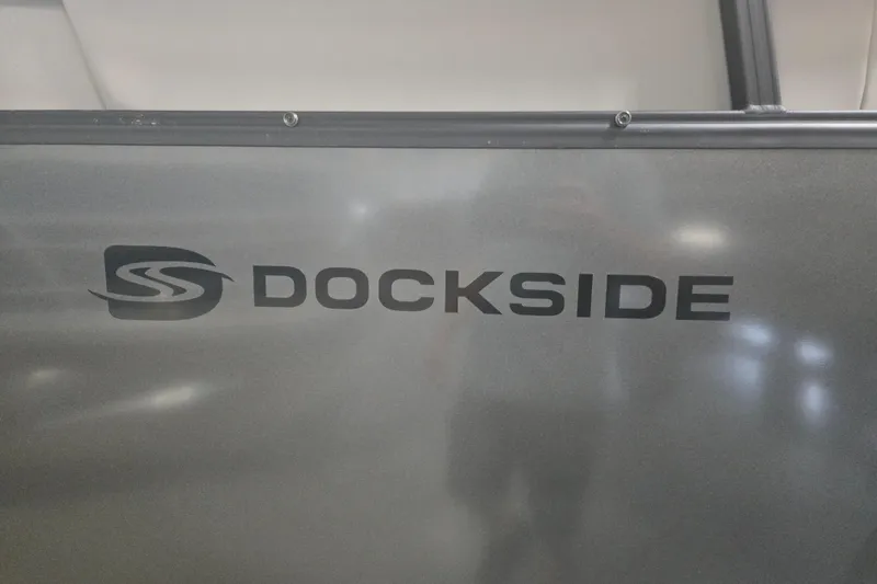 Slide: The Image of Dockside 22DQ275 2026 model logo on metallic surface. - 6