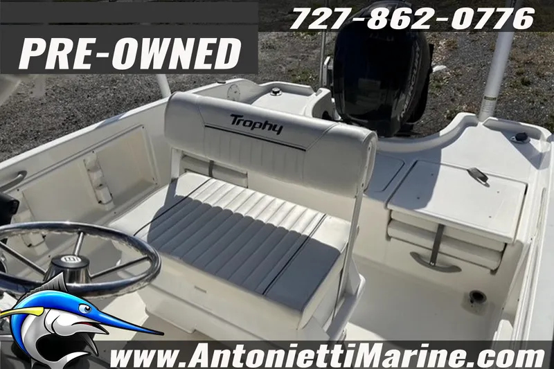Slide: The Image of Pre-owned 2022 Bayliner Trophy T18Bay boat interior with steering wheel and seating. - 9