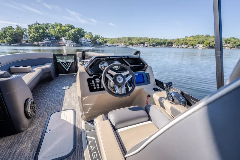 Slide: The Image of Luxurious 2026 Viaggio Z24S boat interior with modern dashboard and scenic lake view. - 39