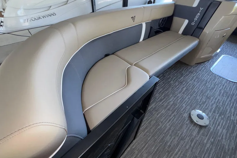 Slide: The Image of Luxurious seating on 2026 Viaggio Z24U boat, featuring beige and gray upholstery. - 11