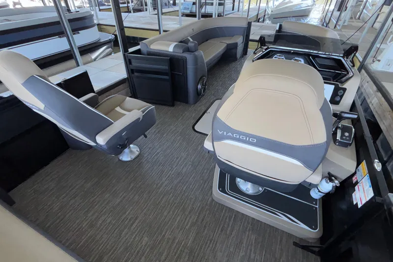 Slide: The Image of Interior of 2026 Viaggio Z24U boat with modern seating and control console. - 14