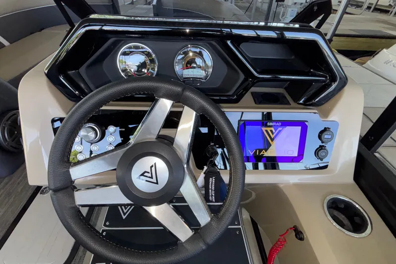 Slide: The Image of Steering console of 2026 Viaggio Z24U boat with modern controls and display. - 15