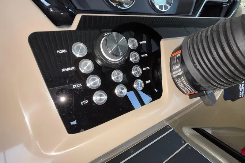 Slide: The Image of Control panel of 2026 Viaggio Z24U boat with labeled buttons and volume knob. - 18
