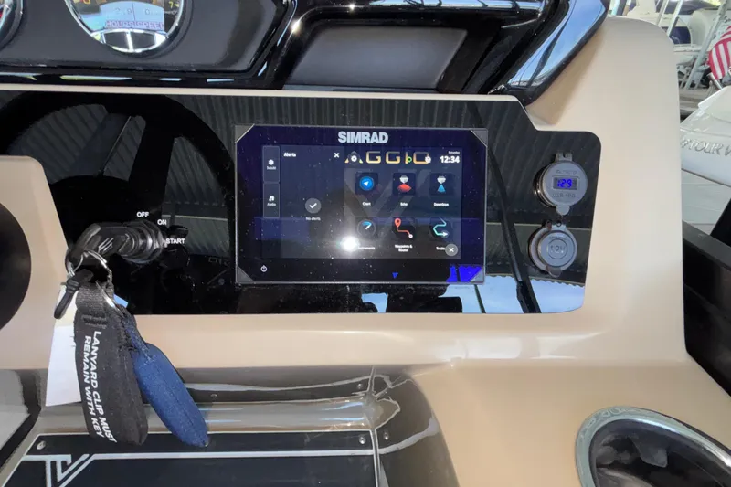Slide: The Image of Dashboard of a 2026 Viaggio Z24U boat featuring a Simrad touchscreen display. - 19