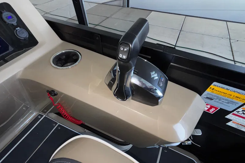 Slide: The Image of Control panel of 2026 Viaggio Z24U boat with throttle lever and safety features. - 20