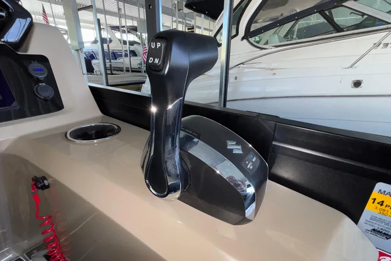 Slide: The Image of Boat throttle control lever in a Viaggio Z24U, 2026 model, with "UP" and "DN" buttons. - 21
