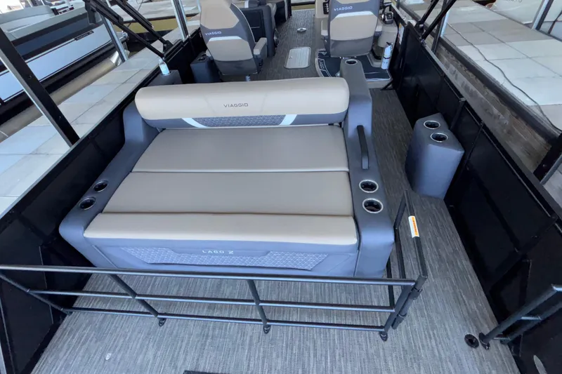 Slide: The Image of Interior of 2026 Viaggio Z24U boat with beige seating and cup holders. - 27