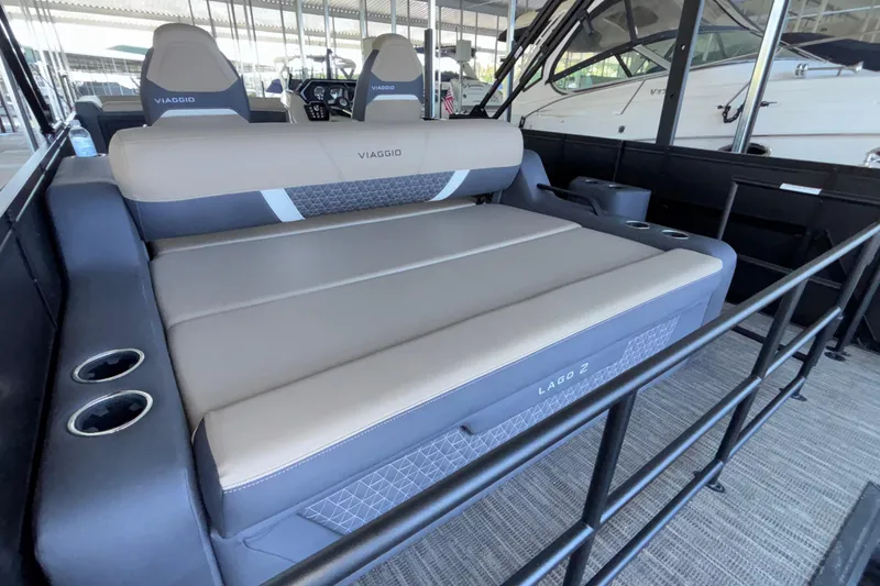 Slide: The Image of Luxurious seating on 2026 Viaggio Z24U boat, featuring comfortable cushions and cup holders. - 28