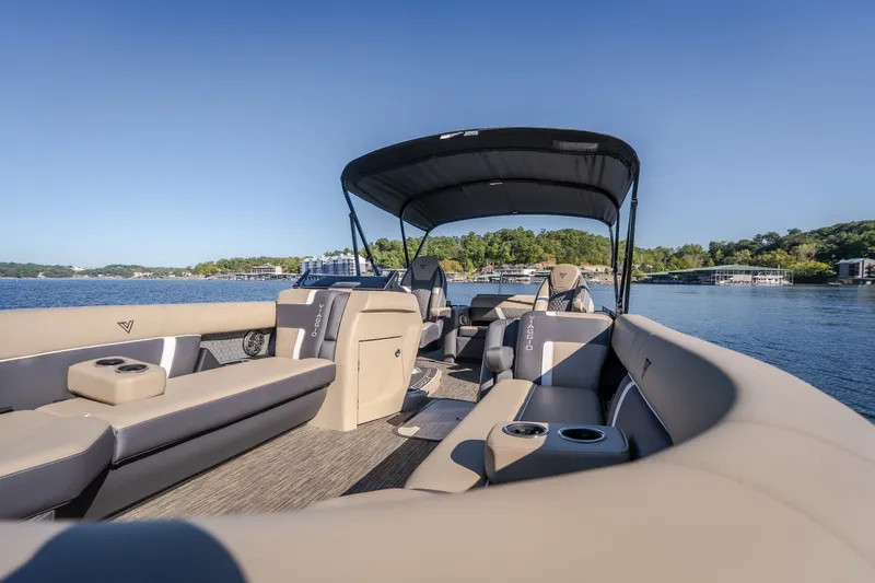 Slide: The Image of Luxurious 2026 Viaggio Z24S pontoon boat with spacious seating on a serene lake. - 30