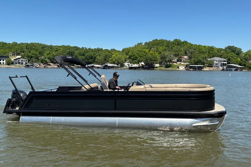 Slide: The Image of 2026 Viaggio Z24U pontoon boat cruising on a scenic lake. - 3