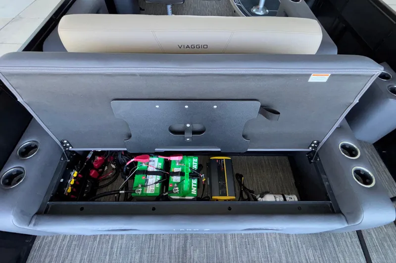 Slide: The Image of Interior view of 2026 Viaggio Z24U boat showing storage compartment with batteries and wiring. - 30