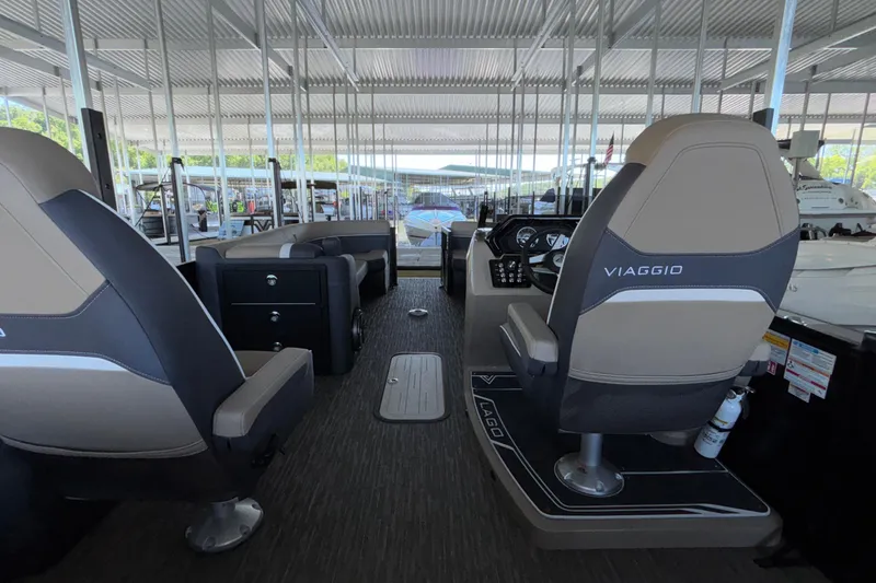 Slide: The Image of Interior of a 2026 Viaggio Z24U boat with modern seating and controls. - 33