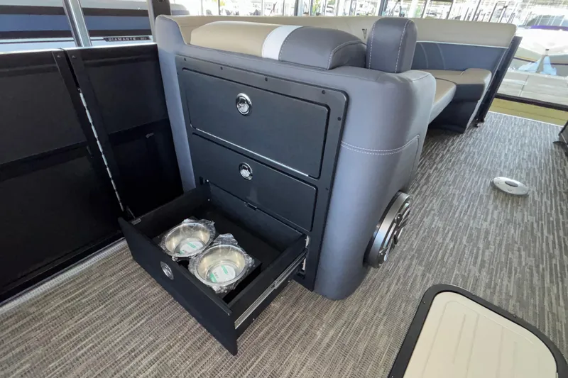 Slide: The Image of Interior of 2026 Viaggio Z24U boat with open storage drawer and seating. - 38